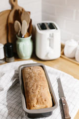 Homemade freshly baked bread on the kitchen table.