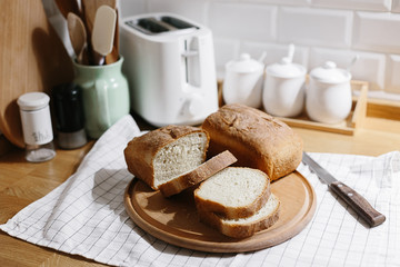Homemade freshly baked bread on the kitchen table.