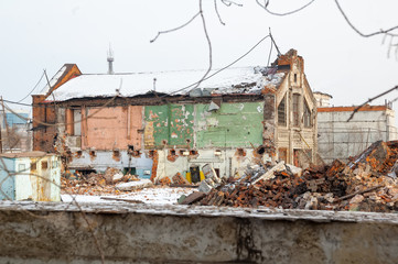 Tyumen, Russia - February 16, 2008: Demolition of machine-tool factory. The building of the shop before demolition