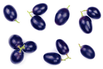 blue grapes isolated on the white background. Top view. Flat lay pattern