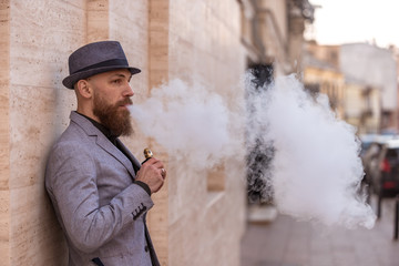 stylish bearded man in bloop wipe habit