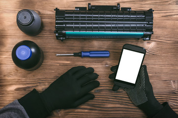 Blank screen mobile phone, printer and laser cartridge. Printer repair service center. Laser...