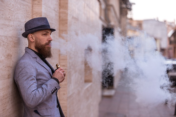 stylish bearded man in bloop wipe habit
