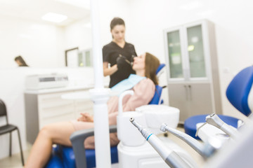 Dental clinic. Reception, examination of the patient. Teeth care. Modern dental equipment.