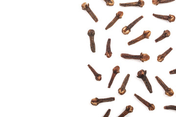 Dry spice cloves or carnation isolated on white background with copy space for your text. Top view. Flat lay