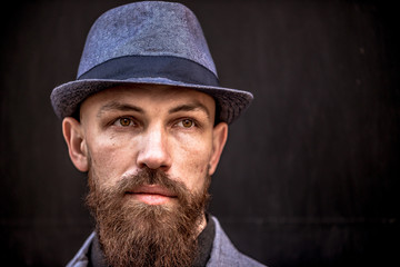 fashion man with a beard in a hat