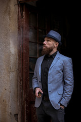 stylish bearded man in bloop wipe habit