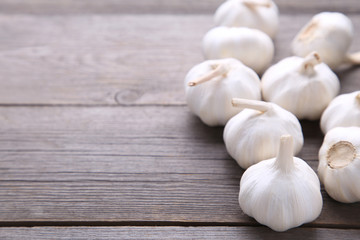 Fresh garlic on a grey wooden background
