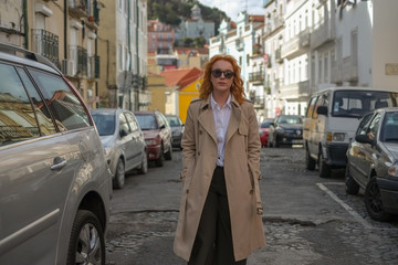 Fototapeta premium young woman walking on the street