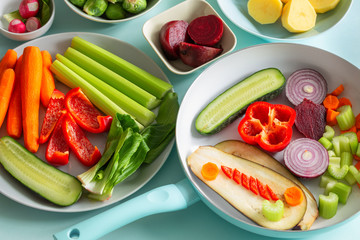 fresh healthy vegetables on a blue pastel background
