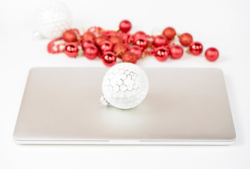 Laptop on christmas background. Office Christmas laptop.