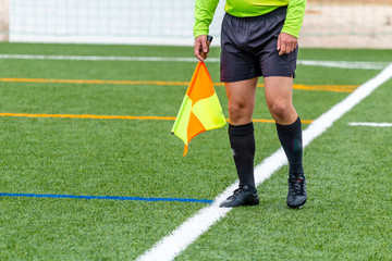 Fototapeta premium Assistant referee hold flag.