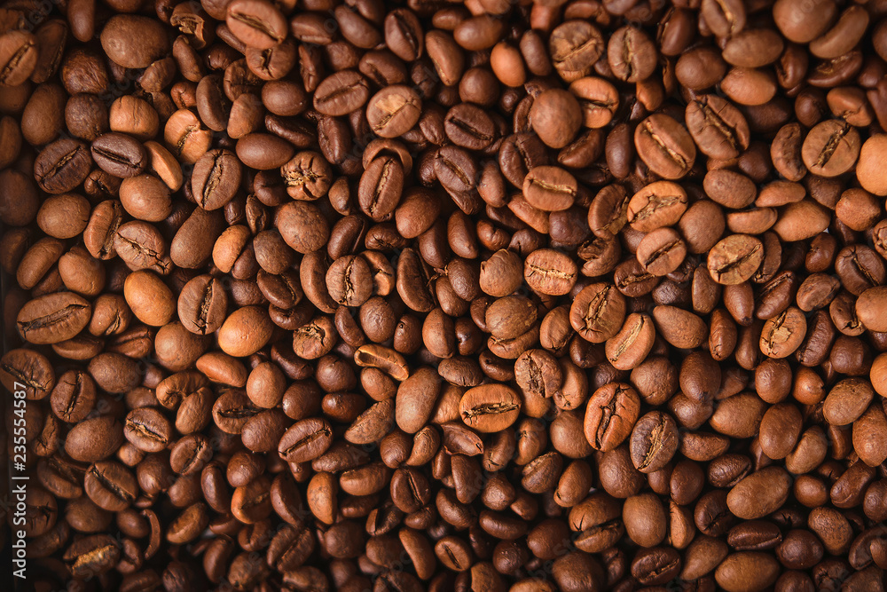 Wall mural Coffee bean background textured pattern.