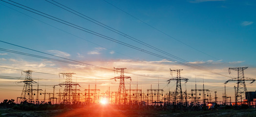 High-voltage power lines. Electricity distribution station. high voltage electric transmission...