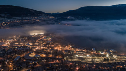 Stratus clouds over Voss town. Hordaland, Norway.