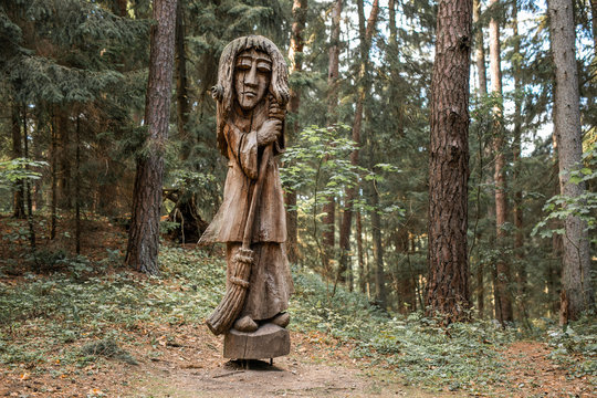 JUODKRANTE, LITHUANIA - AUGUST, 2018: Old wooden sculpture statue portrait, Witch Hill park, Juodkrante, Curinian spit, Lithuania.