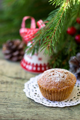 Christmas cupcake on the Christmas table.