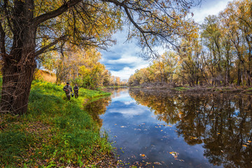 Autumn landscape with fishermen. Suzun, Novosibirsk region, Western Siberia