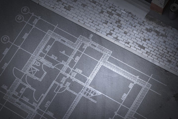 Construction drawings on floor