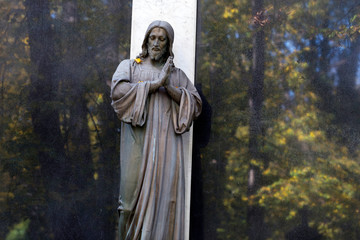 Naklejka premium Historic Statue on the mystery old Prague Cemetery, Czech Republic