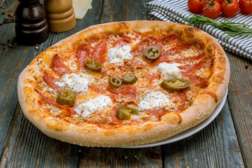 Mexican pizza with meat and jalapeno