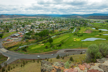 Fototapeta na wymiar Aerial View of Prineville, Oregon, with the Crooked River and gold course