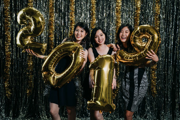 Group of asian friends celebrating New Year