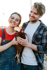 Couple volunteering at an animal sanctuary