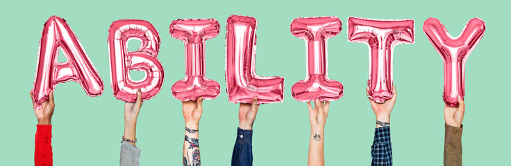 Hands holding ability word in balloon letters