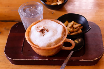 Coffee with  bread  in the morning on Desk for work
