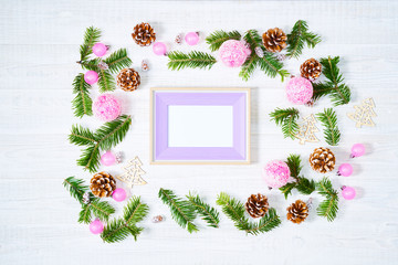 Christmas decorations on white wooden background.