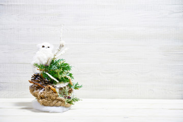 Christmas decorations on white wooden background.