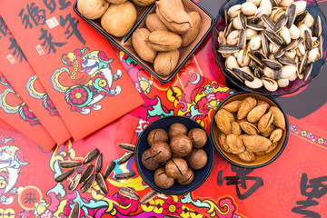 Nuts in the Background of Red Couplet in Spring Festival