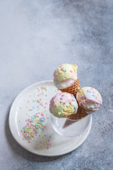 Colorful unicorn ice cream cones