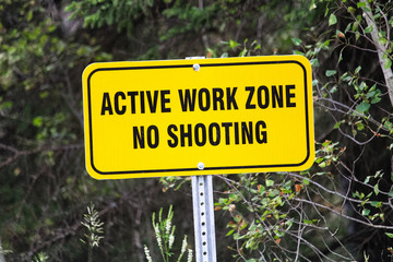 A active work zone no shooting sign