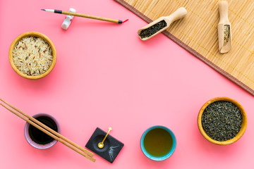 Chinese traditional symbols concept. Tea, rice, hieroglyph love, bambootabe mat, chopsticks, soy...