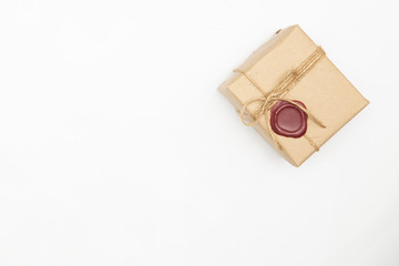 Gift box in vintage brown color on isolated white background.