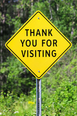 Closeup of a thank you for visiting sign