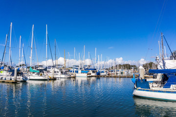 Fototapeta na wymiar Moss Landing marina in Monterey Bay on a sunny day, California