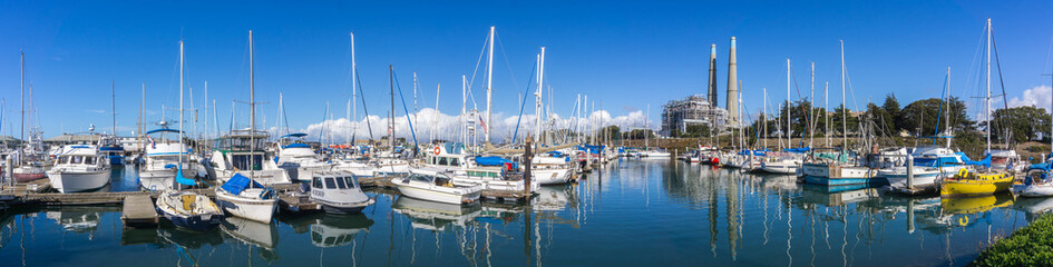 Fototapeta na wymiar Panoramic view of Moss Landing marina in Monterey Bay on a sunny day, California