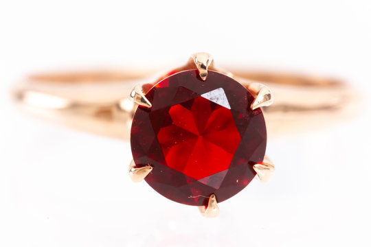 Imperfect ruby gemstone set in gold ring