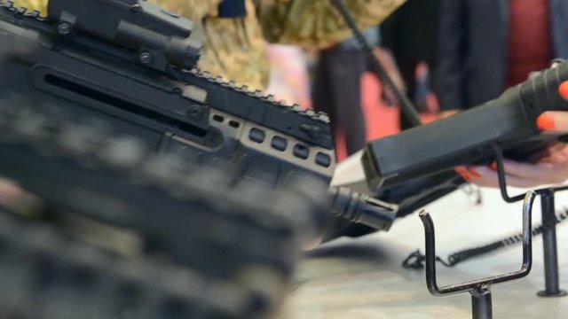 Firearms gun submachine sniper rifle large-caliber weapons close-up.