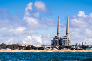 Power plant on the Pacific Ocean coastline, Moss Landing, Monterey Bay, California; This location is going to be transformed by Tesla and PG&E into a storage location for solar and wind energy