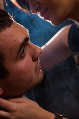 Fototapeta premium Young punk girl cuts her boyfriend