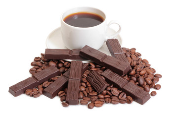 Coffee beans and cute chocolate on white background