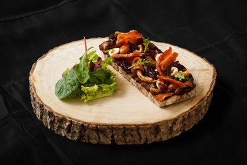 Top view grilled sandwich with bacon and mushrooms