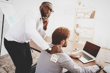 Man Pasted Sticker on Back of Colleague in Office.