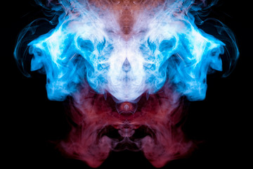 A background of blue, red and green wavy smoke in the shape of a ghost's head or a man of mystical appearance on a black isolated ground. Bright abstract pattern of steam from vape.