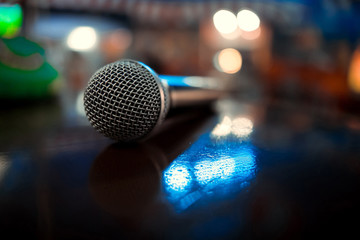 Microphone. Microphone close-up. A pub. Bar. A restaurant. Classical music. Music