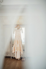 interior of a room and wedding dress